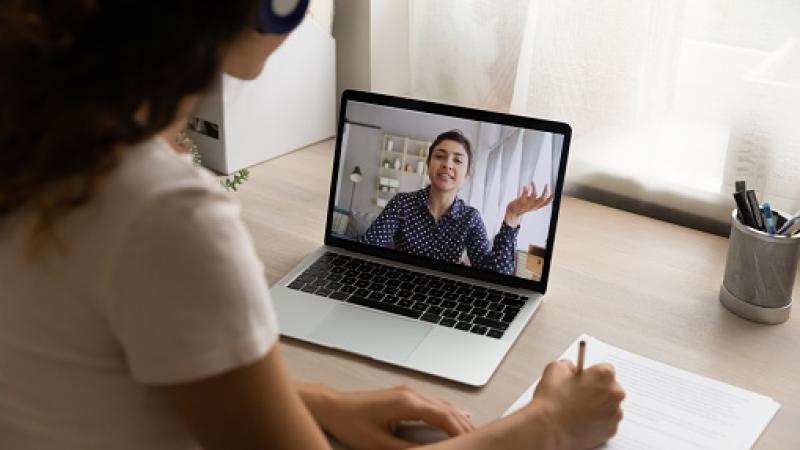 Women viewing screen during one-on-one virtual meeting